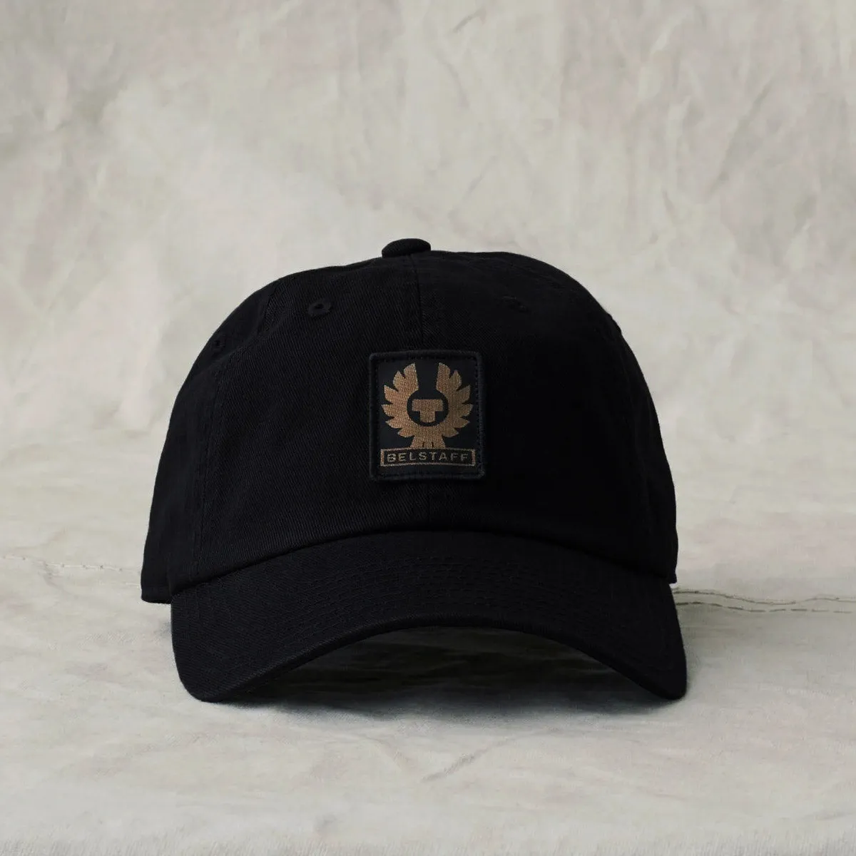 Belstaff black cap with Phoenix logo.