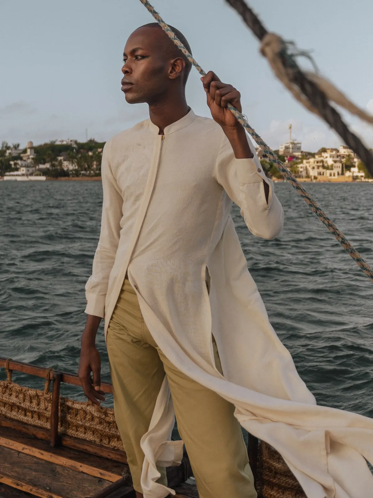 Kanzu Shirt: A traditional African shirt made from high-quality fabric, available in various designs and sizes. Perfect for cult