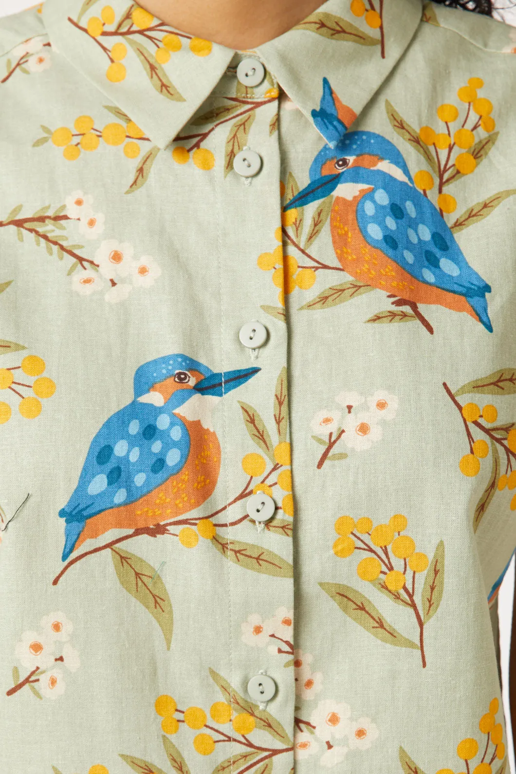 Kingfisher Blouse: Vibrant blue bird-inspired blouse with intricate embroidery. Perfect for a stylish and unique look.