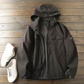 Plus-size outdoor functional windproof and waterproof hooded jacket for men's autumn casual wear.