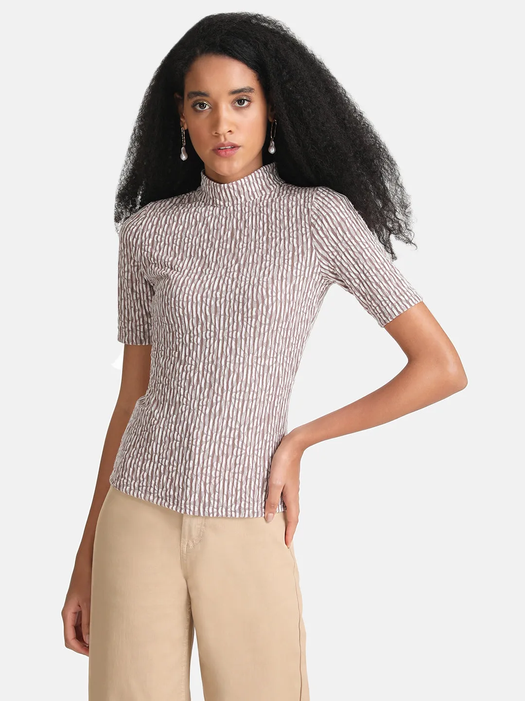 Turtleneck blouse.